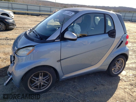 2011 Smart fortwo Pure with VIN WMEEJ3BA3BK432164, listed as a Copart auction lot 43130025 with 72,440 mi miles and Salvage title. Bid and sale history available at DreamBid. Image 1.