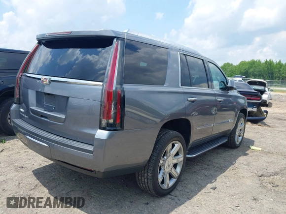 2020 Cadillac Escalade Luxury z VIN 1GYS3BKJ0LR116410, wystawiony jako IAAI lot #42274841 z przebiegiem 75 513 mil mil oraz . Historia ofert i sprzedaży dostępna na DreamBid. Obrazek 4.