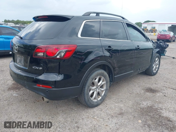2015 Mazda CX-9 Touring with VIN JM3TB2CA4F0465730, listed as a IAAI auction lot 42512203 with 179,805 mi miles and . Bid and sale history available at DreamBid. Image 4.
