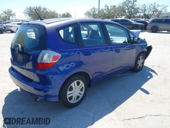 2009 Honda Fit with VIN JHMGE88249S056575, listed as a IAAI auction lot 41702555 with 116,658 mi miles. Bid and sale history available at carsss.com. Image 4.