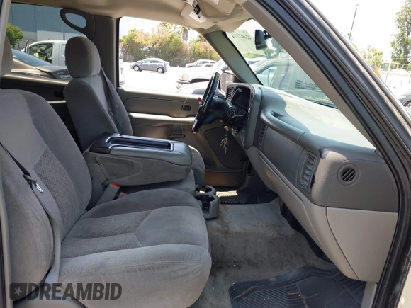 2005 Chevrolet Tahoe LS z VIN 1GNEK13T15J263926, wystawiony jako IAAI lot #42497774 z przebiegiem 342 968 mil mil oraz . Historia ofert i sprzedaży dostępna na DreamBid. Obrazek 5.