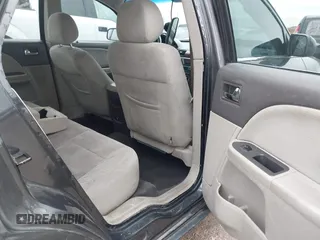 2008 Ford Taurus SEL with VIN 1FAHP24W28G108122, listed as a IAAI auction lot 41546652 with 219,774 mi miles. Bid and sale history available at carsss.com. Image 8.