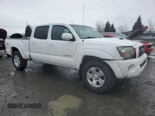 2011 Toyota Tacoma with VIN 3TMMU4FN0BM034343, listed as a Copart auction lot 49742465 with 162,907 mi miles and Salvage title. Bid and sale history available at DreamBid. Image 4.