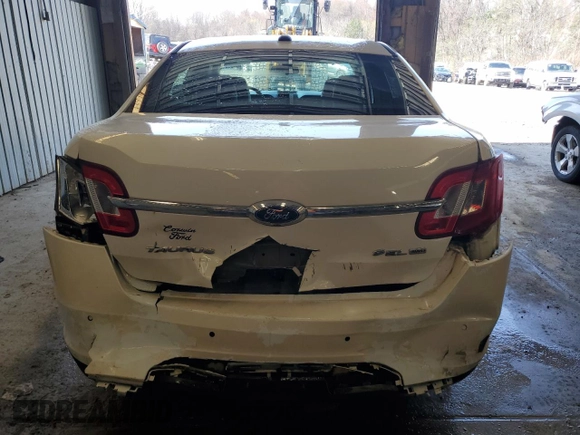 2012 Ford Taurus SEL z VIN 1FAHP2HW8CG133657, wystawiony jako Copart lot #52865895 z przebiegiem 132 876 mil mil oraz Szkoda całkowita • Salvage title. Historia ofert i sprzedaży dostępna na DreamBid. Obrazek 6.