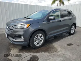 2020 Ford Edge SEL z VIN 2FMPK4J95LBB17293, wystawiony jako Copart lot #58796255 z przebiegiem 82 583 mil mil oraz Czysty tytuł • Clean title. Historia ofert i sprzedaży dostępna na DreamBid. Obrazek 1.