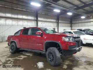 2021 Chevrolet Colorado 4WD ZR2 with VIN 1GCGTEEN1M1112569, listed as a Copart auction lot 45168895 with 70,775 mi miles and Salvage Title. Bid and sale history available at carsss.com. Image 4.