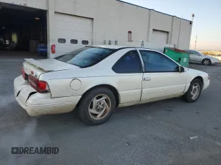 1996 Ford Thunderbird LX with VIN 1FALP62W0TH162431, listed as a Copart auction lot 41864445 with 183,798 mi miles and Salvage Title. Bid and sale history available at DreamBid. Image 3.