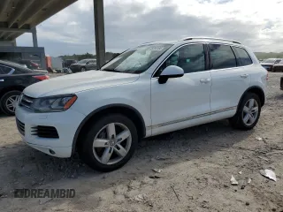 2012 Volkswagen Touareg Exec with VIN WVGEF9BP1CD008717, listed as a Copart auction lot 86095164 with 211,089 mi miles and Clean Title. Bid and sale history available at DreamBid. Image 1.