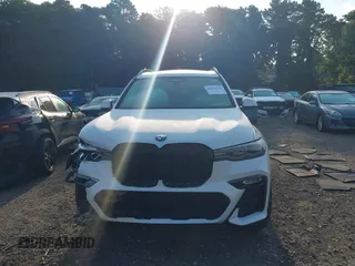 2019 BMW X7 xDrive50i z VIN 5UXCX4C53KLB40280, wystawiony jako IAAI lot #39936228 z przebiegiem Nie podano mil oraz . Historia ofert i sprzedaży dostępna na DreamBid. Obrazek 6.
