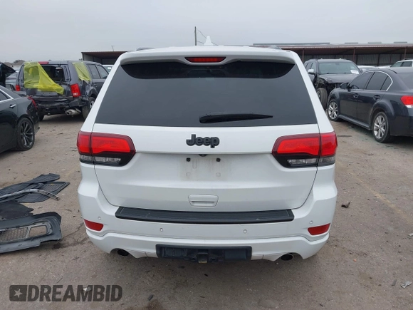 2015 Jeep Grand Cherokee Altitude with VIN 1C4RJEAG2FC901391, listed as a IAAI auction lot 41565763 with 220,685 mi miles. Bid and sale history available at carsss.com. Image 16.