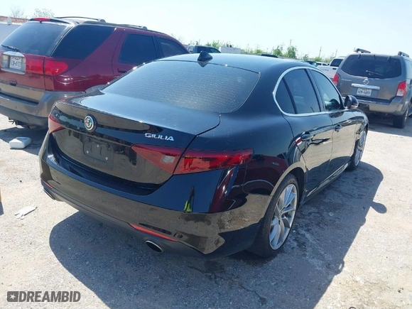 2019 Alfa Romeo Giulia with VIN ZARFAMAN0K7598745, listed as a IAAI auction lot 41872396 with 59,755 mi miles. Bid and sale history available at carsss.com. Image 4.