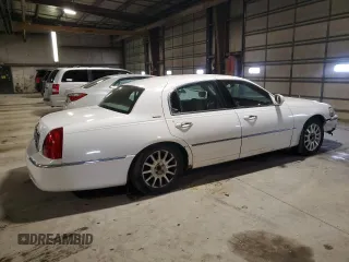 2007 Lincoln Town Car Signature с VIN 1LNHM81V97Y631594, выставлен на аукционе Copart как лот 54314315 с пробегом 293 930 миль миль и Списание • Salvage title. История ставок и продаж доступна на DreamBid. Изображение 3.