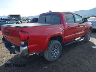 2018 Toyota Tacoma SR with VIN 3TMCZ5AN2JM134145, listed as a IAAI auction lot 41124645 with 61,302 mi miles. Bid and sale history available at carsss.com. Image 4.