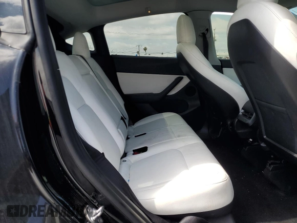 2020 Tesla Model Y Long Range with VIN 5YJYGDEE6LF051549, listed as a Copart auction lot 55063805 with 77,861 mi miles and Salvage Title. Bid and sale history available at DreamBid. Image 11.