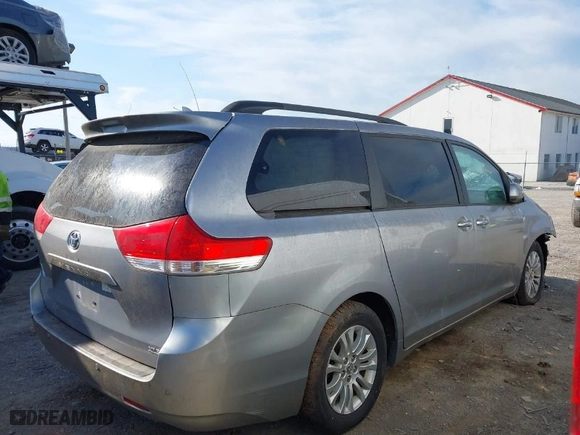 2012 Toyota Sienna XLE AAS with VIN 5TDYK3DC6CS181724, listed as a IAAI auction lot 41848192 with 100,973 mi miles. Bid and sale history available at carsss.com. Image 13.