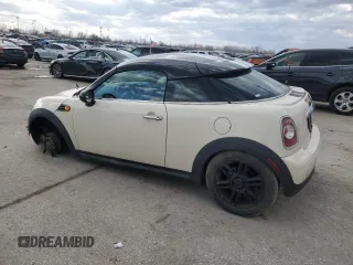 2013 MINI Coupe z VIN WMWSX1C56DT507407, wystawiony jako Copart lot #48176045 z przebiegiem 110 616 mil mil oraz Szkody całkowita. Historia ofert i sprzedaży dostępna na DreamBid. Obrazek 2.