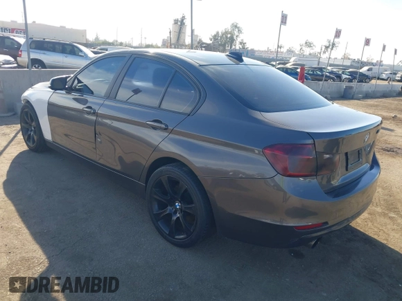 2014 BMW 3 Series 328i with VIN WBA3A5C56EP603819, listed as a IAAI auction lot 41217764 with 156,140 mi miles and . Bid and sale history available at carsss.com. Image 3.