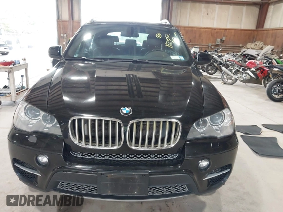 2012 BMW X5 50i with VIN 5UXZV8C50CL425721, listed as a IAAI auction lot 42590676 with 192,355 mi miles and . Bid and sale history available at DreamBid. Image 12.
