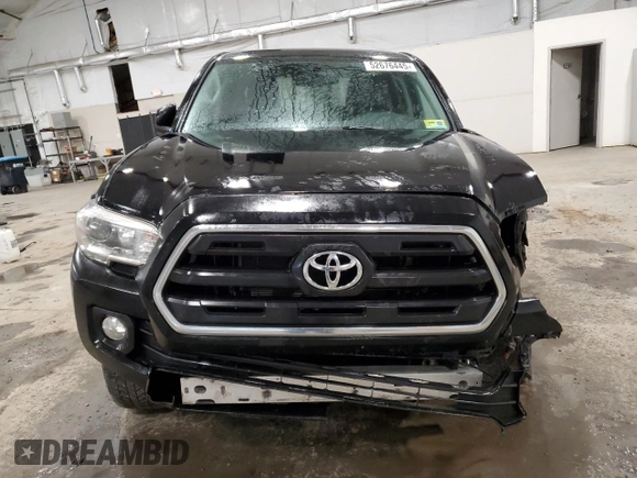 2017 Toyota Tacoma SR5 with VIN 5TFDZ5BN5HX028165, listed as a Copart auction lot 52676445 with 114,824 mi miles and Salvage Title. Bid and sale history available at carsss.com. Image 5.