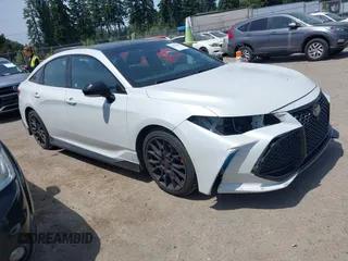 2021 Toyota Avalon TRD z VIN 4T1FZ1FB1MU064895, wystawiony jako IAAI lot #42453709 z przebiegiem 58 349 mil mil oraz . Historia ofert i sprzedaży dostępna na DreamBid. Obrazek 1.