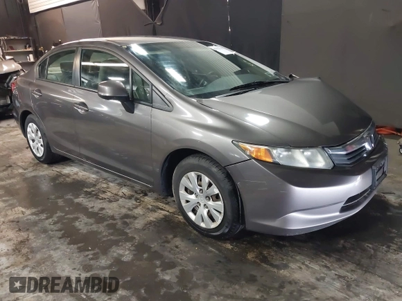 2012 Honda Civic LX z VIN 19XFB2F59CE373830, wystawiony jako IAAI lot #42312118 z przebiegiem 106 541 mil mil oraz . Historia ofert i sprzedaży dostępna na DreamBid. Obrazek 1.