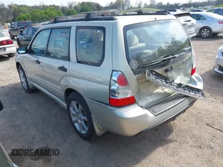2006 Subaru Forester 2.5 X with VIN JF1SG63636H705351, listed as a IAAI auction lot 41957115 with 206,418 mi miles. Bid and sale history available at carsss.com. Image 3.