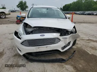 2016 Ford Focus Titanium z VIN 1FADP3N23GL345904, wystawiony jako Copart lot #60139525 z przebiegiem 97 572 mil mil oraz Szkoda całkowita • Salvage title. Historia ofert i sprzedaży dostępna na DreamBid. Obrazek 5.