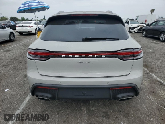2024 Porsche Macan with VIN WP1AA2A59RLB18288, listed as a Copart auction lot 57804455 with 7,480 mi miles and Salvage title. Bid and sale history available at DreamBid. Image 6.