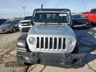 2023 Jeep Wrangler Sport S with VIN 1C4HJXDG0PW670641, listed as a Copart auction lot 41623195 with 27,266 mi miles and Salvage Title. Bid and sale history available at DreamBid. Image 5.