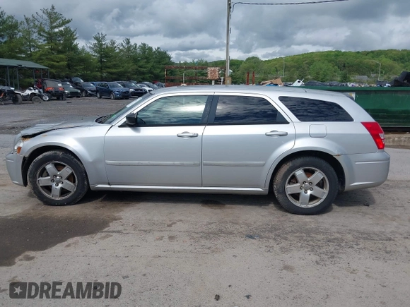 2005 Dodge Magnum SXT z VIN 2D4GZ48V358579406, wystawiony jako IAAI lot #42198627 z przebiegiem 264 473 mil mil oraz . Historia ofert i sprzedaży dostępna na DreamBid. Obrazek 14.