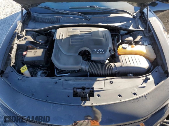 2015 Dodge Charger SXT with VIN 2C3CDXHG8FH769883, listed as a Copart auction lot 87723825 with 81,859 mi miles and Salvage Title. Bid and sale history available at DreamBid. Image 12.