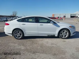 2018 Ford Fusion SE with VIN 3FA6P0H71JR262575, listed as a IAAI auction lot 41408259 with 96,624 mi miles and . Bid and sale history available at DreamBid. Image 12.
