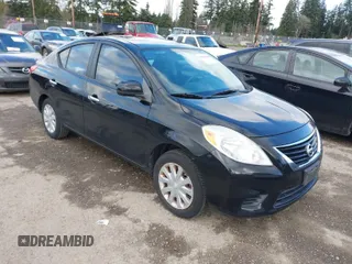2012 Nissan Versa SV with VIN 3N1CN7APXCL804433, listed as a IAAI auction lot 41960448 with 165,421 mi miles. Bid and sale history available at carsss.com. Image 1.