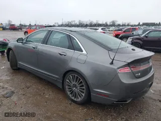 2014 Lincoln MKZ with VIN 3LN6L2GK2ER801312, listed as a IAAI auction lot 41209977 with 152,577 mi miles. Bid and sale history available at carsss.com. Image 3.