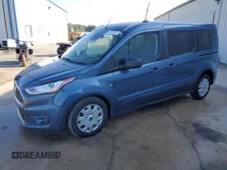 2022 Ford Transit Connect XLT with VIN NM0GS9F21N1509938, listed as a Copart auction lot 79404264 with 103,223 mi miles and Clean title. Bid and sale history available at DreamBid. Image 1.