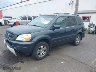 2004 Honda Pilot EX with VIN 2HKYF18444H583826, listed as a IAAI auction lot 41812601 with 196,846 mi miles. Bid and sale history available at carsss.com. Image 17.