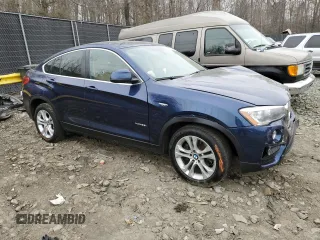 2015 BMW X4 xDrive28i with VIN 5UXXW3C50F0M87438, listed as a Copart auction lot 44620294 with 132,243 mi miles. Bid and sale history available at carsss.com. Image 4.