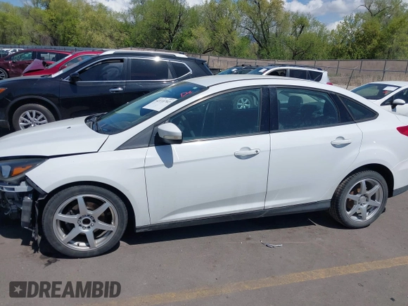 2017 Ford Focus SE with VIN 1FADP3F24HL232527, listed as a IAAI auction lot 42110702 with 95,327 mi miles and . Bid and sale history available at DreamBid. Image 15.