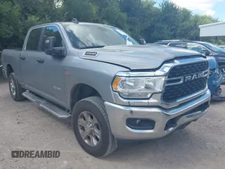2024 Ram 2500 Big Horn with VIN 3C6UR5DL1RG336569, listed as a IAAI auction lot 42595091 with 30,453 mi miles and . Bid and sale history available at DreamBid. Image 1.