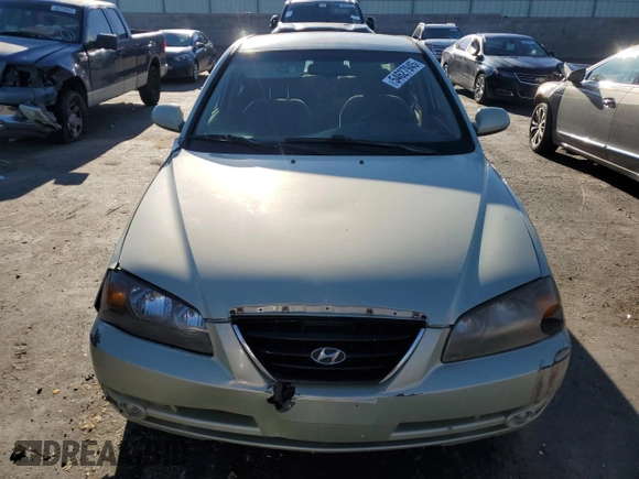 2004 Hyundai Elantra GLS z VIN KMHDN46D64U919337, wystawiony jako Copart lot #54627945 z przebiegiem 184 087 mil mil oraz Szkoda całkowita • Salvage title. Historia ofert i sprzedaży dostępna na DreamBid. Obrazek 5.