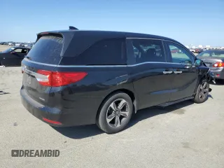 2018 Honda Odyssey Touring with VIN 5FNRL6H80JB065039, listed as a Copart auction lot 54944595 with 81,987 mi miles and Salvage Title. Bid and sale history available at carsss.com. Image 3.