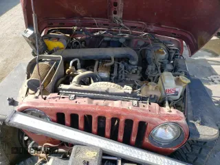 1999 Jeep Wrangler Sport with VIN 1J4FY19S5XP493117, listed as a Copart auction lot 57490792 with Not provided miles and Salvage title. Bid and sale history available at DreamBid. Image 7.