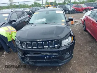 2017 Jeep Compass Latitude with VIN 3C4NJCBB3HT653021, listed as a IAAI auction lot 42263281 with 91,076 mi miles and . Bid and sale history available at DreamBid. Image 12.
