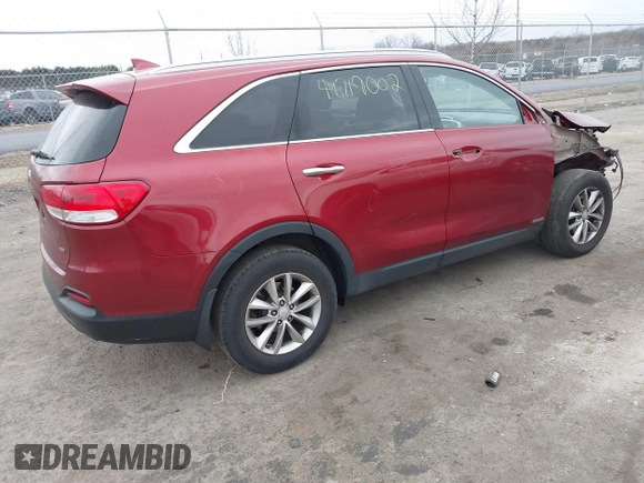 2016 Kia Sorento LX with VIN 5XYPGDA38GG165504, listed as a IAAI auction lot 41719002 with 126,424 mi miles. Bid and sale history available at carsss.com. Image 4.