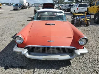 1957 Ford Thunderbird with VIN D7FH395675, listed as a Copart auction lot 77234434 with 15,312 mi miles and Salvage Title. Bid and sale history available at DreamBid. Image 5.