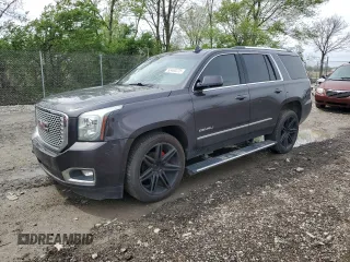 2015 GMC Yukon Denali z VIN 1GKS2CKJ0FR514448, wystawiony jako Copart lot #53463275 z przebiegiem 70 143 mil mil oraz Szkoda całkowita • Salvage title. Historia ofert i sprzedaży dostępna na DreamBid. Obrazek 1.