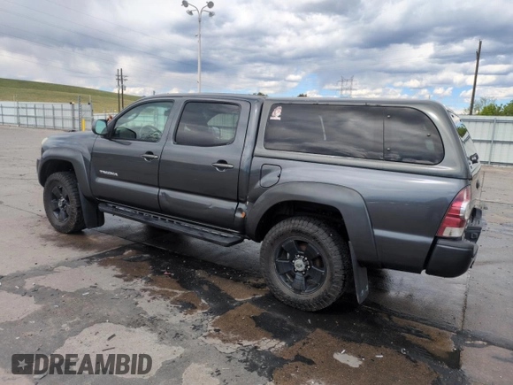 2009 Toyota Tacoma with VIN 3TMLU42N39M024000, listed as a Copart auction lot 55301375 with 210,068 mi miles and Salvage Title. Bid and sale history available at DreamBid. Image 2.