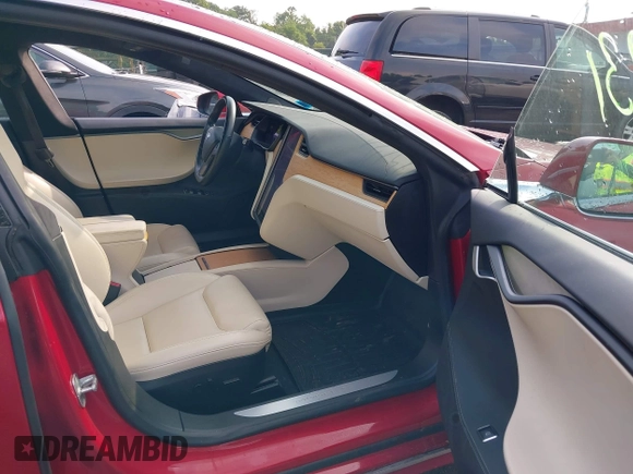 2020 Tesla Model S Long Range with VIN 5YJSA1E25LF396213, listed as a IAAI auction lot 42383231 with 73,125 mi miles and . Bid and sale history available at DreamBid. Image 5.
