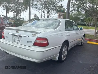 2000 Infiniti Q45 z VIN JNKBY31A0YM700503, wystawiony jako Copart lot #59358045 z przebiegiem 121 244 mil mil oraz Tytuł czysty. Historia ofert i sprzedaży dostępna na DreamBid. Obrazek 4.