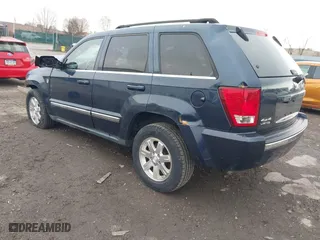2009 Jeep Grand Cherokee Limited with VIN 1J8HR58P89C542314, listed as a IAAI auction lot 41880894 with 103,032 mi miles. Bid and sale history available at carsss.com. Image 3.